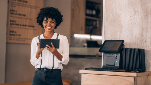 restaurant working holding a tablet